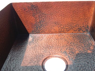 Unrimmed Squared Hammered Copper Bar Sink Close-Up
